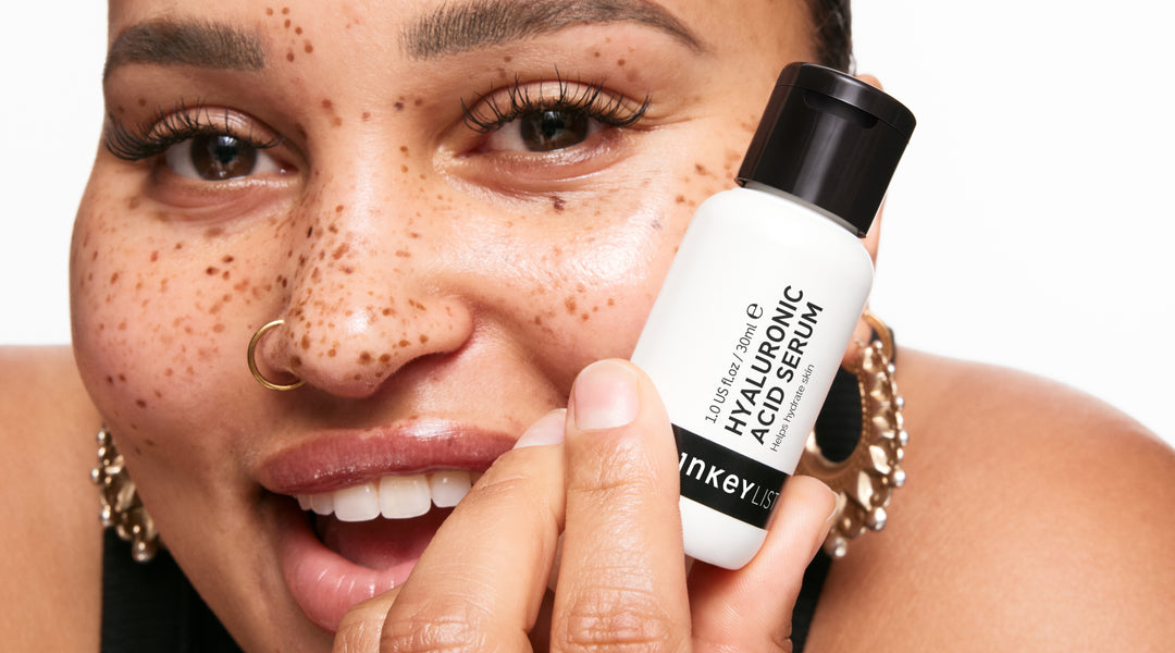 Model holding Hyaluronic Acid Serum