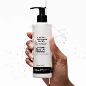 Model holding Hydrating Cream-to-Milk Cleanser