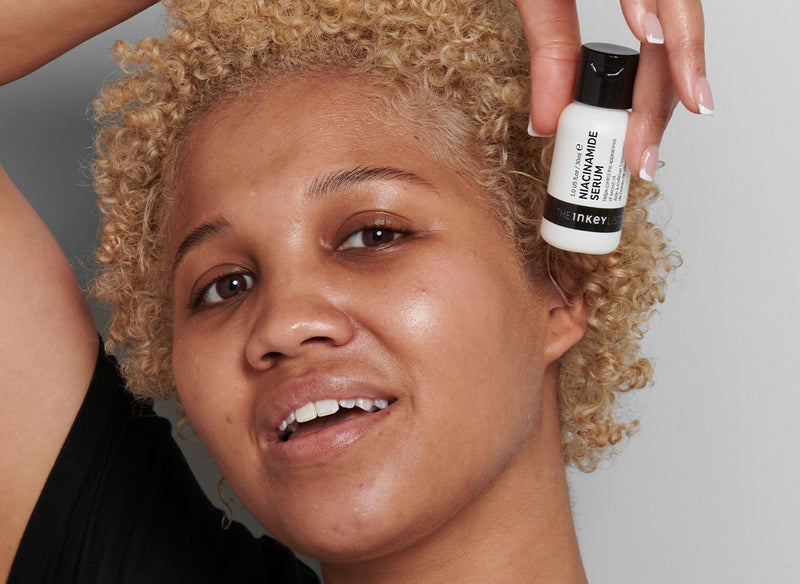 Model applying skincare