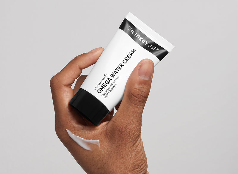 Model holding Omega Water Cream