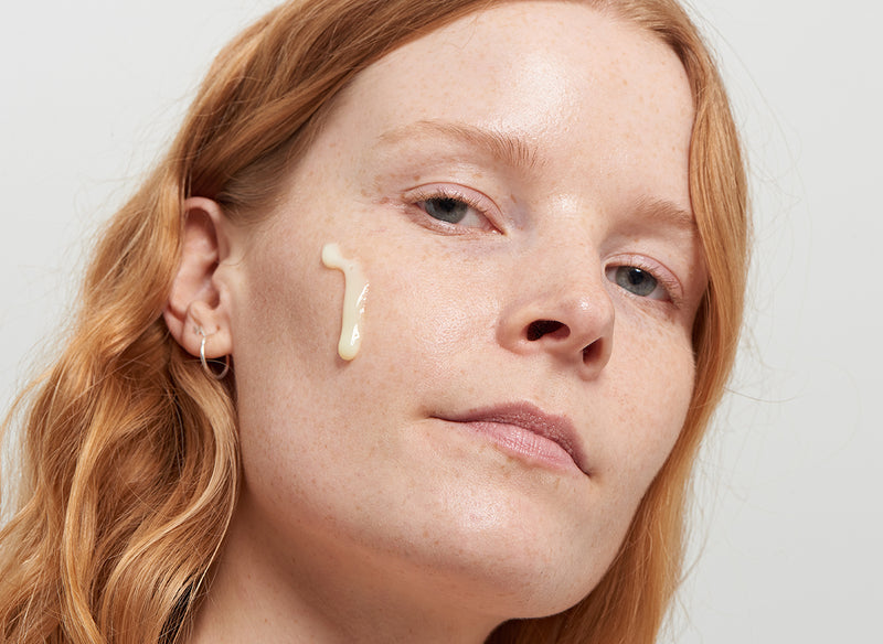 Model with Retinol on her face
