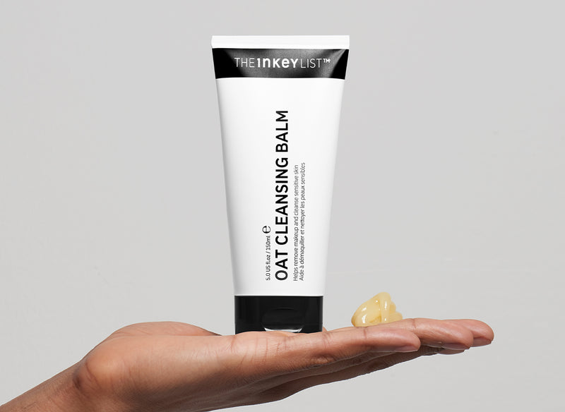 Model with Oat Cleansing Balm on their palm