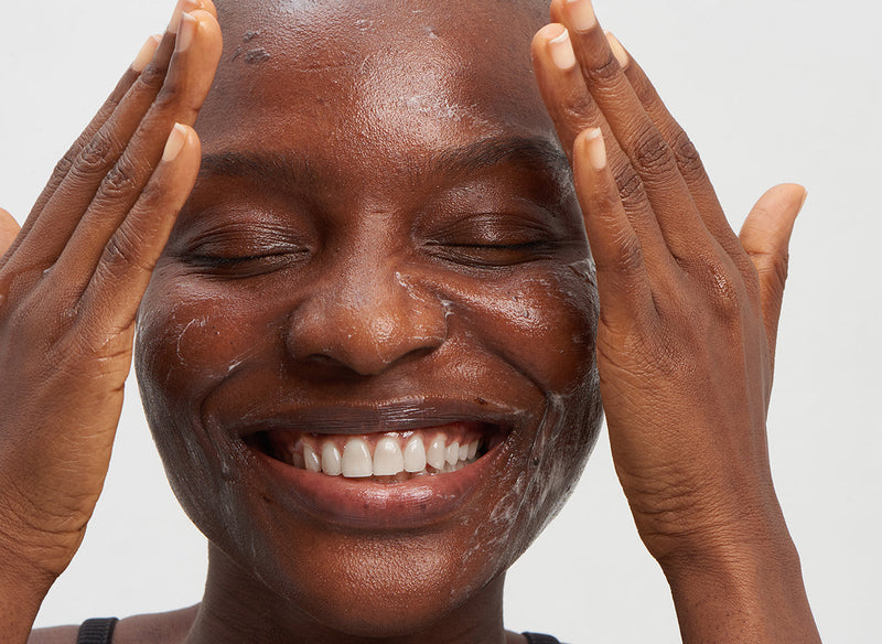 Model washing her face