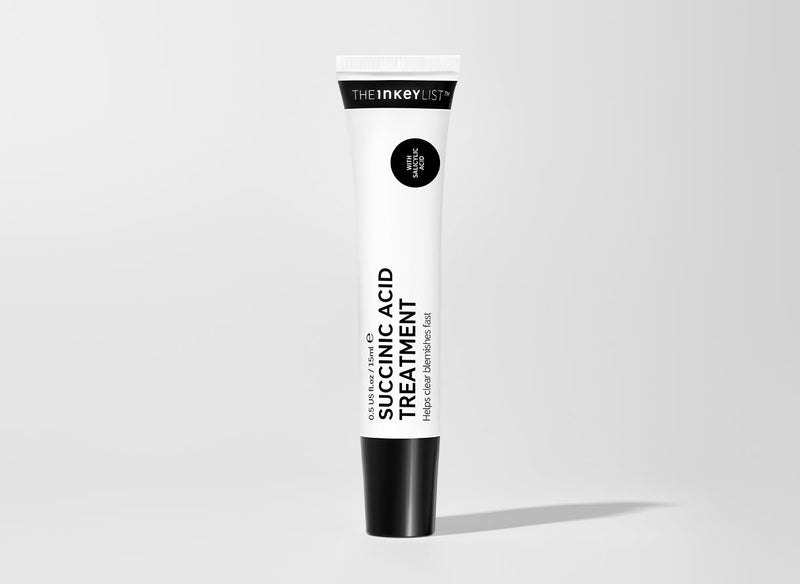 Succinic Acid bottle on white background