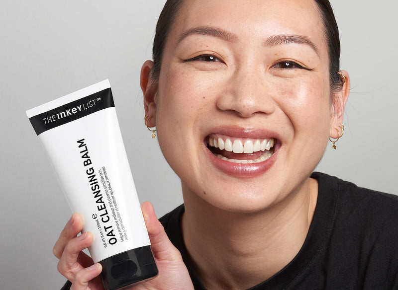 Model holding Oat Cleansing Balm
