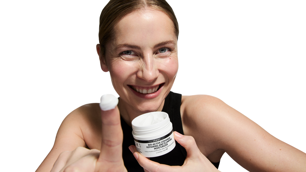 Model holding oat cleansing balm