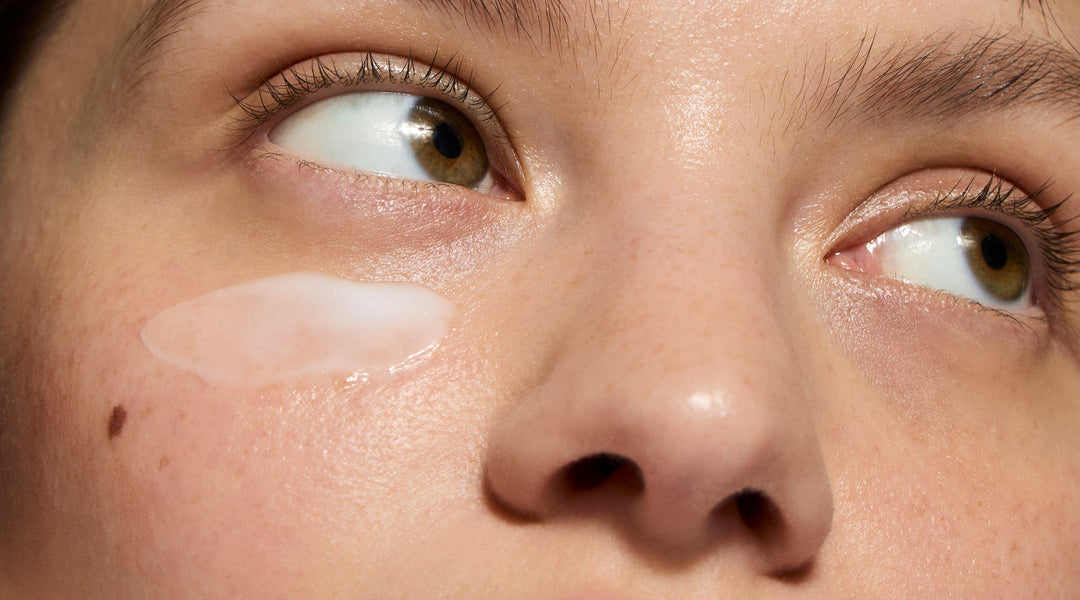 Model with skincare swatch on face