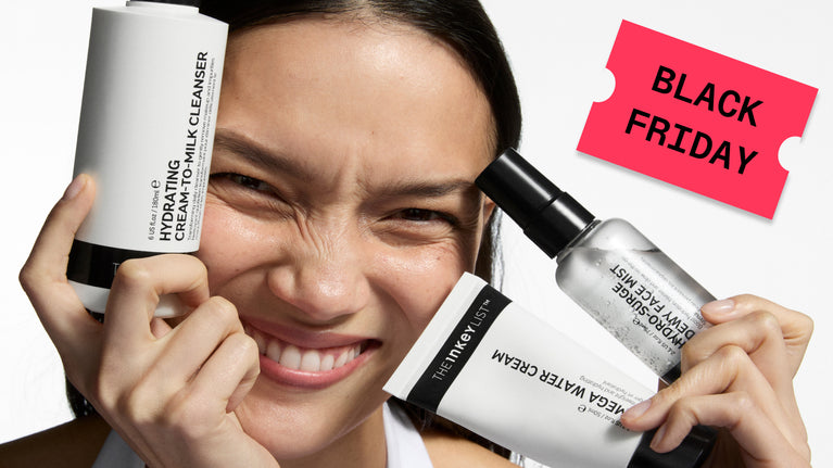 Person holding skincare products with a Black Friday ticket in the background