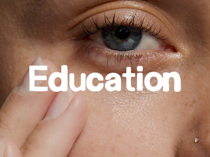 Close-up of a person's eye with the word 'Education' overlaid.