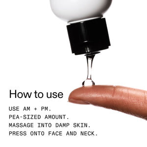 Bottle of skincare product with droplet on finger and usage instructions.