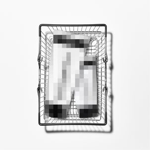 Metal wire basket with a blurred product inside on a white background