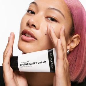 Model holding Omega Water Cream