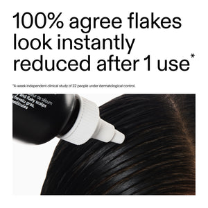 Salicylic Acid Exfoliating Scalp Treatment being applied to scalp with text about flake reduction after one use