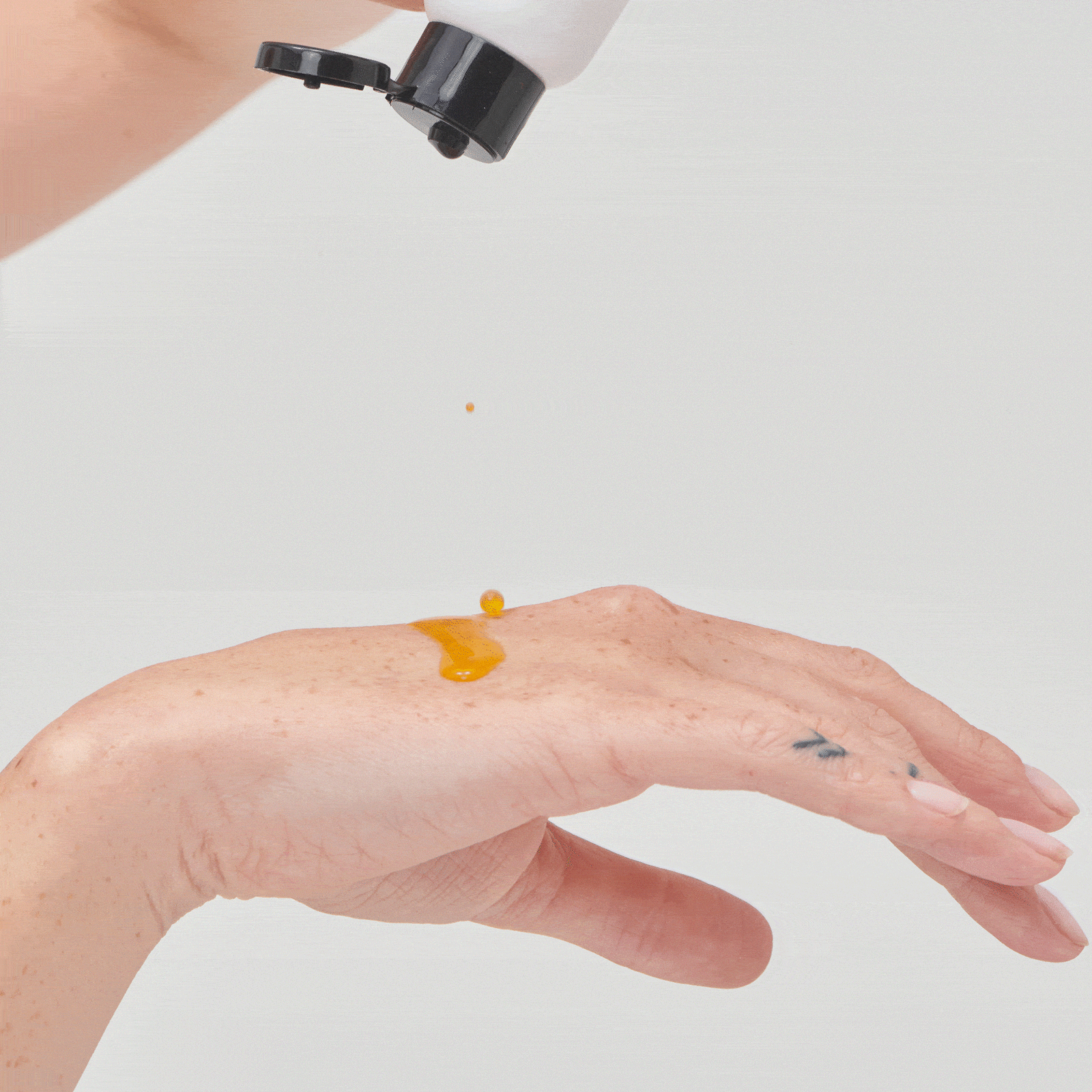 Video Rosehip Oil applied on model's hand